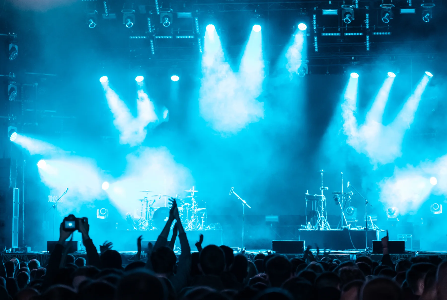 Concert crowd and stage lights at a live event